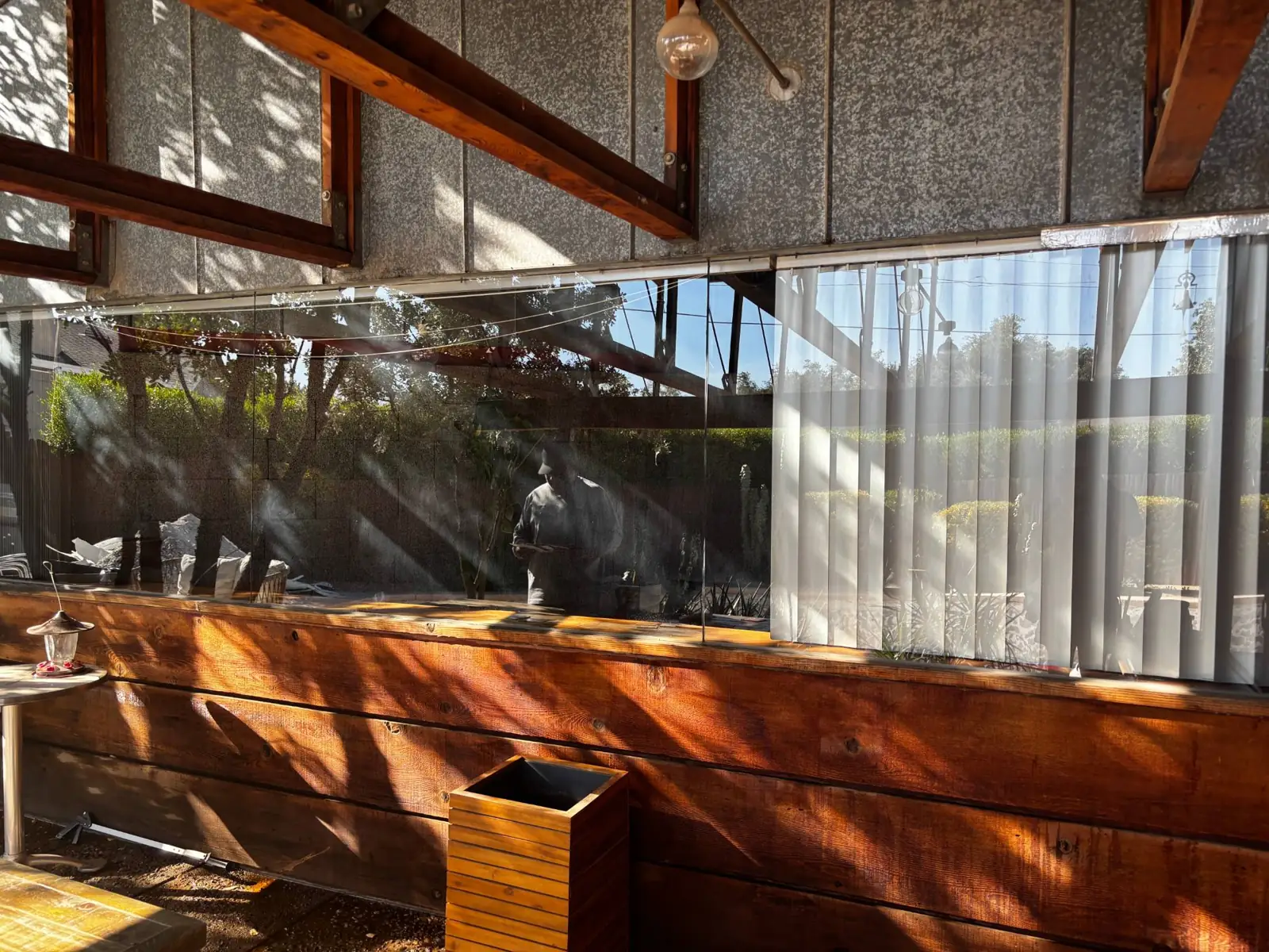 Spotless picture window on a wood home
